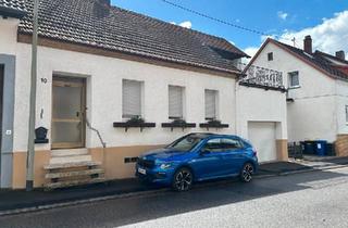 Einfamilienhaus kaufen in 66540 Neunkirchen, Neunkirchen - Einfamilienhaus mit großer Garage und überschaubarem Grundstück i