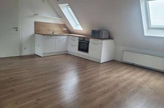 Wohnung kaufen in 47918 Tönisvorst, Sanierte Dachgeschosswohnung mit viel Platz