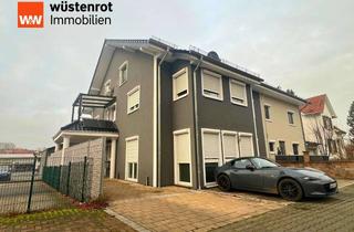 Wohnung kaufen in 55232 Alzey, Helle 3-Zimmer-Erdgeschosswohnung mit hochwertigem Kamin, privatem Garten und Stellplätzen in Alzey