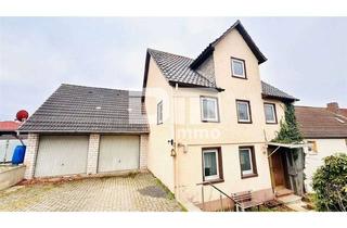 Einfamilienhaus kaufen in 34253 Lohfelden, Sanierungsbedürftiges Einfamilienhaus + Doppelgarage mit viel Potenzial