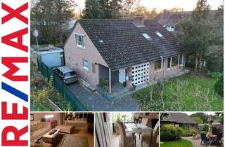 Haus kaufen in 47551 Bedburg-Hau, Zweifamilienhaus mit Wintergarten und vielseitigen Nutzungsmöglichkeiten auf tollem Grund !