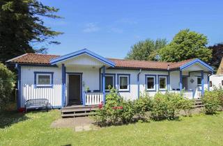 Haus kaufen in 18556 Wiek, Kapitalanlage in Wiek – Renditestarker Bungalow mit zwei Wohneinheiten