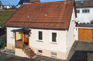 Einfamilienhaus kaufen in 72488 Sigmaringen, Attraktiver Start in die eigenen vier Wände, gemütliches Einfamilienhaus mit Garten und Garage