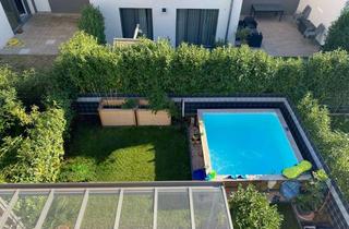 Haus kaufen in Berghausener Weg 13, 76297 Stutensee, KfW-40 Endhaus mit Südgarten, Studio, Garage & Pool