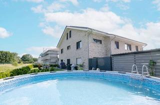 Wohnung kaufen in 49179 Ostercappeln, Exklusive Maisonette-Wohnung mit stilvoller Ausstattung in Ostercappeln