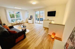 Wohnung kaufen in 82205 Gilching, 2 Zimmer + Hobbyraum: Gartenwohnung mit 105 qm Wohn-Nutzfläche & Sauna