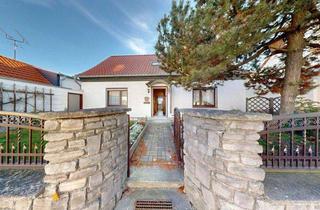 Einfamilienhaus kaufen in 39240 Groß Rosenburg, Behagliches Einfamilienhaus mit Balkon, Kamin & Nebengebäude - perfekt für ruhiges, zentrales Wohnen