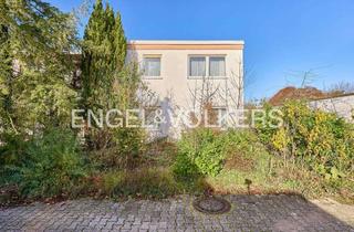 Haus kaufen in 67117 Limburgerhof, Harmonischer Split-Level-Bungalow mit Einliegerwohnung und privatem Garten