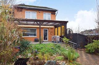 Haus kaufen in 30853 Langenhagen, Gemütliches Reihenendhaus mit Kamin, Fußbodenheizung und Vollkeller in gesuchter Lage in Langenhagen