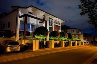 Villa kaufen in 38448 Wolfsburg, Exklusive Stadtvilla mit zwei Wohneinheiten, großem Grundstück und Premium-Ausstattung