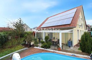 Einfamilienhaus kaufen in 33659 Bielefeld, Modernes KfW-60 Einfamilienhaus mit PV-Anlage, Wintergarten & Pool in Bielefeld-Senne (EEK A+)