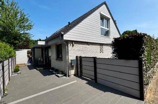 Haus kaufen in 40789 Monheim, Monheim am Rhein - Ein-Zweifamilienhaus mit großem Garten in ruhiger Randlage