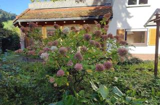 Wohnung kaufen in 79183 Waldkirch, Waldkirch - 4,5 Zimmer Erdgeschosswohnung mit Traumgarten