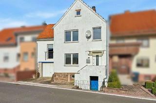 Haus kaufen in 36151 Burghaun, Gut angebunden: Reihenmittelhaus in Steinbach