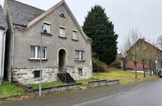 Einfamilienhaus kaufen in 56269 Marienhausen, Einfamilienhaus mit großem Grundstück und vielseitigem Entwicklungspotenzial