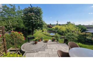 Villa kaufen in 51109 Brück, Traumhafte Familienvilla mit Gartenoase zum Wohlfühlen