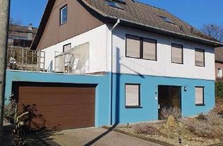 Einfamilienhaus kaufen in Jagdhausweg 12, 42113 Wuppertal, Freistehendes Einfamilienhaus, mit Doppelgarage, sehr großer Nutzfläche und Garten mit Hochbeet.