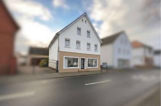 Mehrfamilienhaus kaufen in 65479 Raunheim, Mehrfamilienhaus mit Gewerbeeinheit und Entwicklungspotenzial – attraktive Kapitalanlage