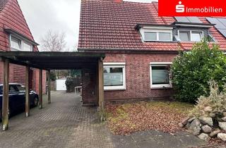 Doppelhaushälfte kaufen in 25746 Heide, Modernisierte Doppelhaushälfte in Heide Süd