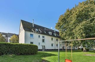 Wohnung kaufen in 46446 Emmerich, Charmante Dachgeschosswohnung mit Modernisierungsspielraum in bahnhofsnaher Wohnlage