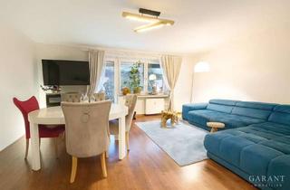 Wohnung kaufen in 85757 Karlsfeld, 3 Zimmer-Wohnung mit separatem Dachstudio, Garten und Garage