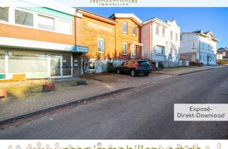 Anlageobjekt in 23738 Lensahn, Mehrfamilienhaus mit zwei Ladenflächen und zwei Wohnungen mitten in Lensahn