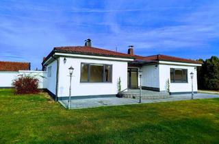 Haus kaufen in 94486 Osterhofen, Osterhofen - Freistehender Bungalow mit Nebengebäude auf ca. 2.000 qm Grund