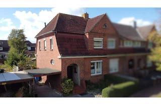 Haus kaufen in 26725 Friesland, Historisches Reihenendhaus in schöner Siedlungslage von Emden-Friesland