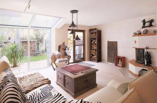 Haus kaufen in 71679 Asperg, Modernisiertes Reihenmittelhaus: Flexibles Wohnkonzept mit zwei Tiefgaragenstellplätzen