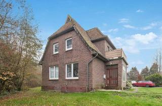 Haus kaufen in 26349 Jade, Renovierungsbedürftiges Dreifamilienhaus mit großem Grundstück und zwei Garagen in Jaderberg