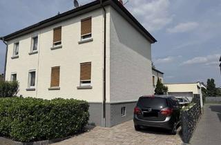 Einfamilienhaus kaufen in 64546 Mörfelden-Walldorf, Charmantes Einfamilienhaus mit gepflegtem Garten in bester Lage von Mörfelden-Walldorf