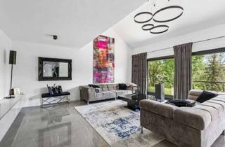 Villa kaufen in 65232 Taunusstein, Villaartiges Einfamilienhaus mit 446 m² Wohnfläche und Wellnessbereich