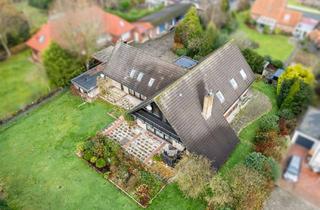 Einfamilienhaus kaufen in 26409 Wittmund, Wohnen im Grünen: Großes Einfamilienhaus mit Einliegerwohnung & Parkähnlichem Garten