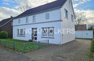 Haus kaufen in 26452 Sande, Haus mit 3 Wohnungen - Potenzial für Kapitalanleger oder Eigennutzer