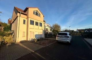 Haus kaufen in 63654 Büdingen, Charmantes Zweifamilienhaus mit traumhaftem Weitblick über Büdingen