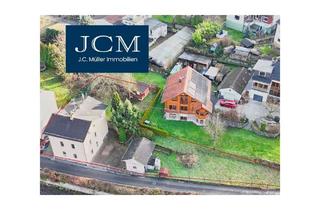 Haus kaufen in 56132 Nievern, Geräumiges 3-Familienhaus mit Garten und Stellplätzen in Nievern an der Lahn