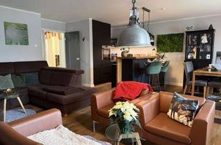 Wohnung kaufen in 26203 Wardenburg, Moderne Zwei-Zimmer-Erdgeschosswohnung mit großer Terrasse und Garten in Wardenburg
