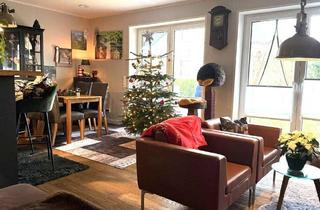 Wohnung kaufen in 26203 Wardenburg, Moderne Zwei-Zimmer-Erdgeschosswohnung mit großer Terrasse und Garten in Wardenburg