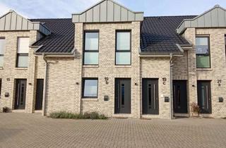 Wohnung kaufen in 26203 Wardenburg, Moderne Zwei-Zimmer-Erdgeschosswohnung mit großer Terrasse und Garten in Wardenburg