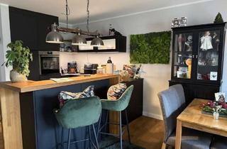 Wohnung kaufen in 26203 Wardenburg, Moderne Zwei-Zimmer-Erdgeschosswohnung mit großer Terrasse und Garten in Wardenburg