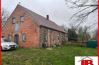 Haus kaufen in 26969 Butjadingen, Wohnhaus auf großem Grundstück im Herzen der Gemeinde Butjadingen