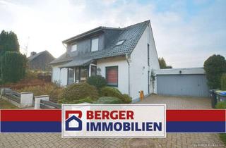 Haus kaufen in 28816 Stuhr, Individuell gestaltetes Zweifamilienhaus in ruhiger Lage von Stuhr-Moordeich