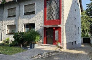 Haus kaufen in 46240 Bottrop, Miethaushälfte mit 3 Wohnungen, Garten und 5 Garagen in Bottrop-Batenbrock-Süd *provisionsfrei!*