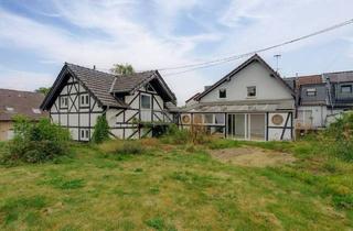 Haus kaufen in 51465 Bergisch Gladbach, Bergisch Gladbach - Charmantes, renovierungsbedürftiges Zweifamilienhaus mit großem Grundstück