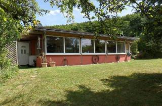 Haus kaufen in 61276 Weilrod, Weilrod - RESERVIERT! Ihr kleines Paradies: Kompakter Bungalow auf idyllischem Grundstück