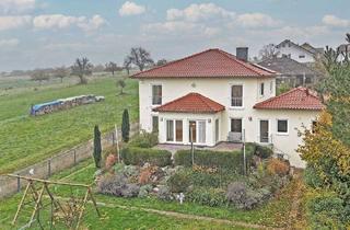 Haus kaufen in 35519 Rockenberg, Rockenberg - Traumhaftes Haus in Feldrandlage mit atemberaubendem Weitblick