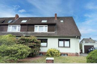 Haus kaufen in 28832 Achim, Achim - Haushälfte mit zwei vermieteten Wohneinheiten und großem Grundstück!