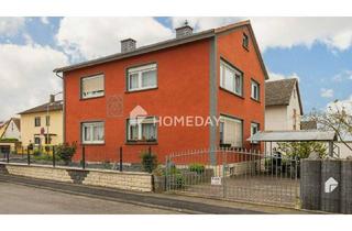 Haus kaufen in 61194 Niddatal, Niddatal - Attraktives MFH mit Garten und 3 Stellplätzen in ruhiger Wohngegend