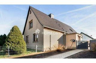 Haus kaufen in 06780 Zörbig, Zörbig - Solide gebaut, modernisiert & vielseitig nutzbar: EFH mit Garage, Nebengebäude und großem Grundstück