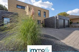 Einfamilienhaus kaufen in 52525 Heinsberg, Heinsberg - Modernes Einfamilienhaus mit Einliegerwohnung in idyllischer Feldrandlage, Garten und Südterrasse